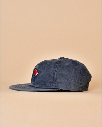Casquette bleue avec fleur brodée Parra