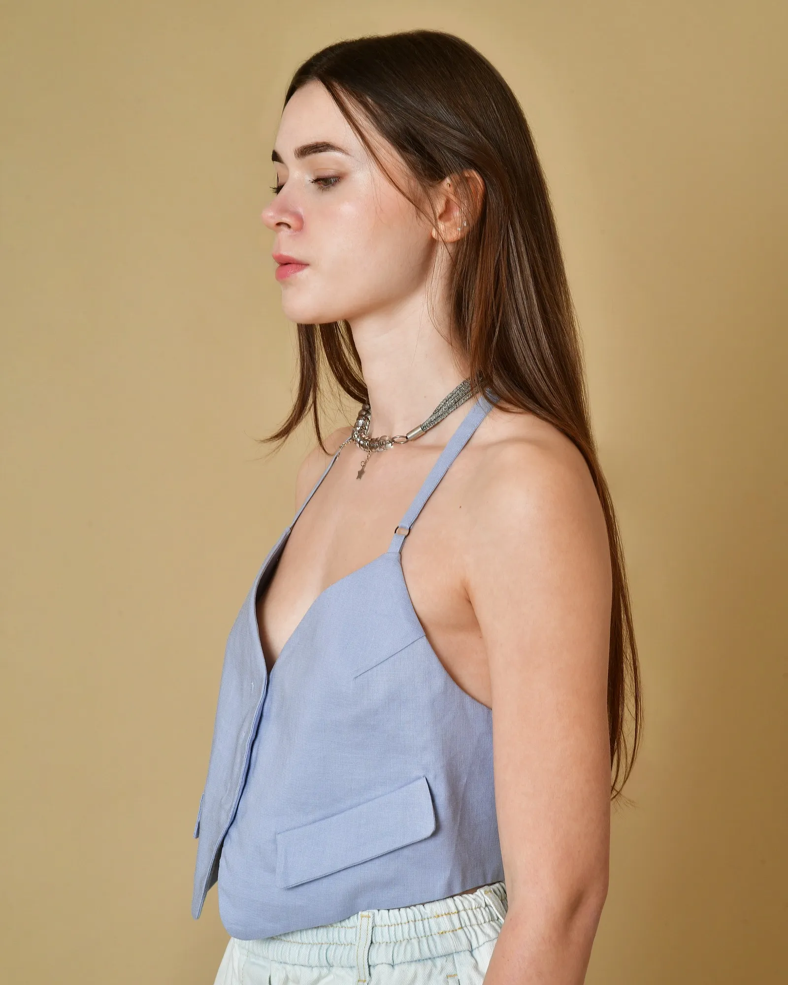 Gilet en lin bleu dos nu Tela