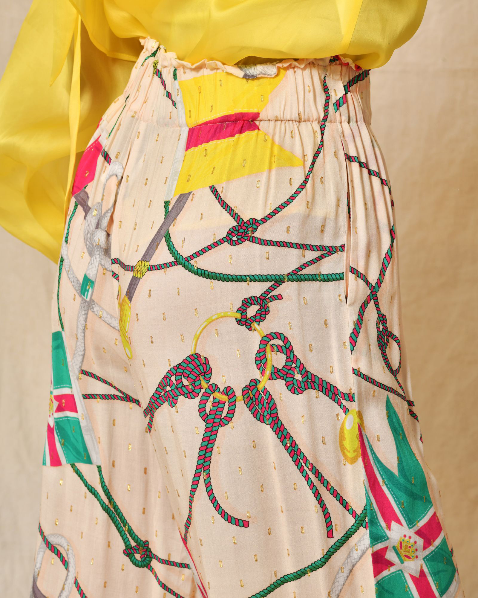 Pantalon beige à imprimés multicolores Edward Achour