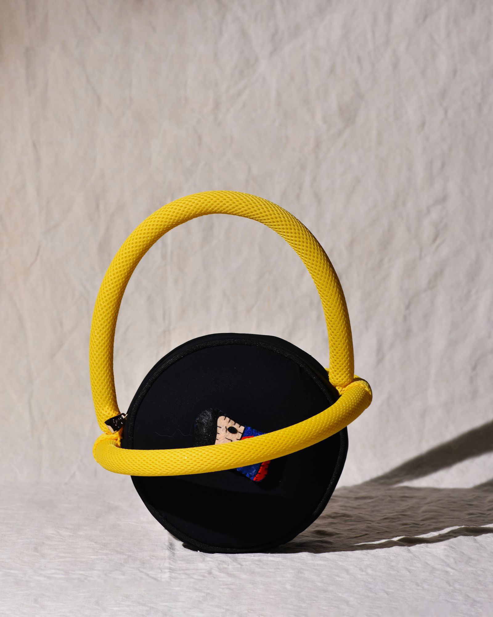 Sac à main rond design à broderie super-héros La Milanesa