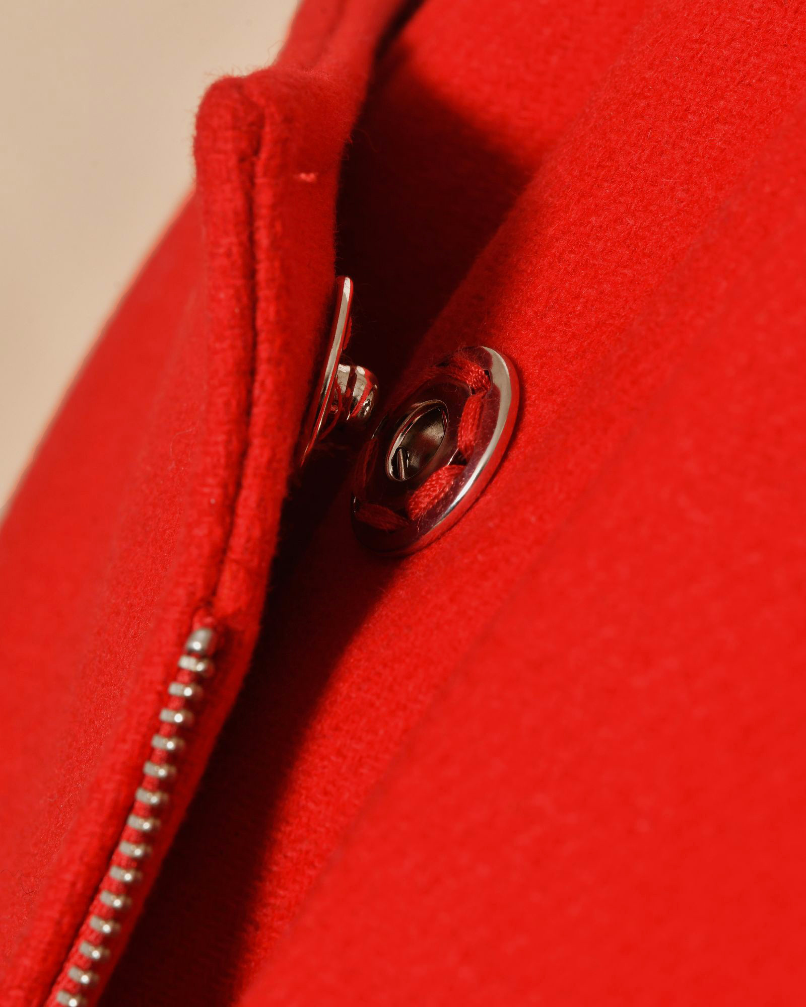 Gilet long rouge à fermeture zippée asymétrique Malloni