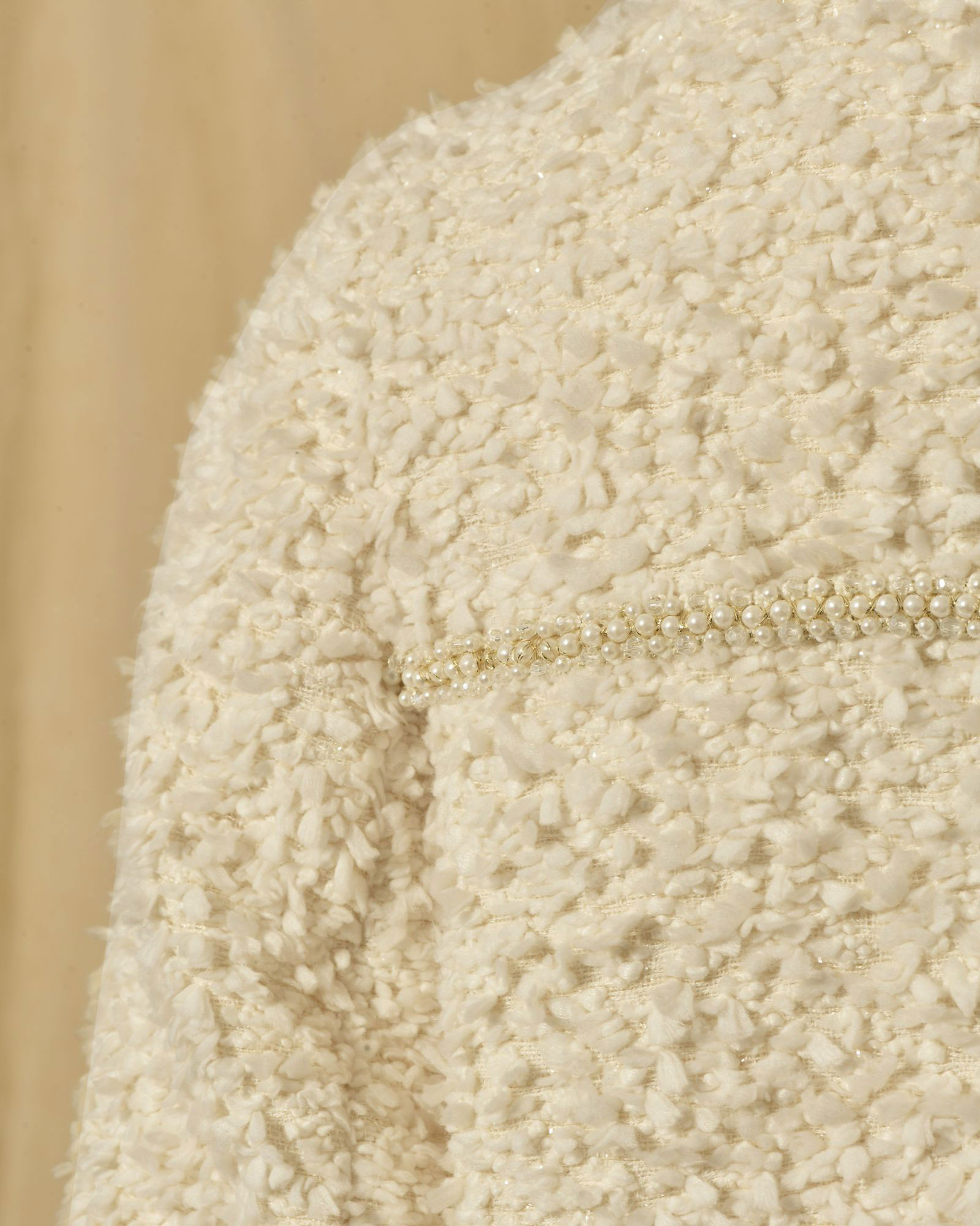 Veste longue en tweed écru et finitions perlées Edward Achour