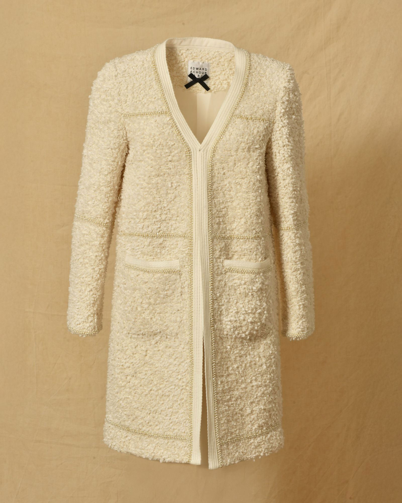 Veste longue en tweed écru et finitions perlées Edward Achour