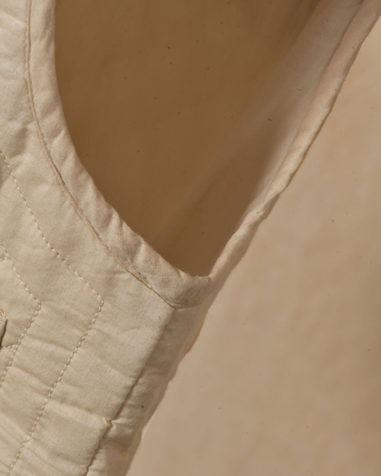 Gilet sans manches matelassé à imprimé abstrait Diega