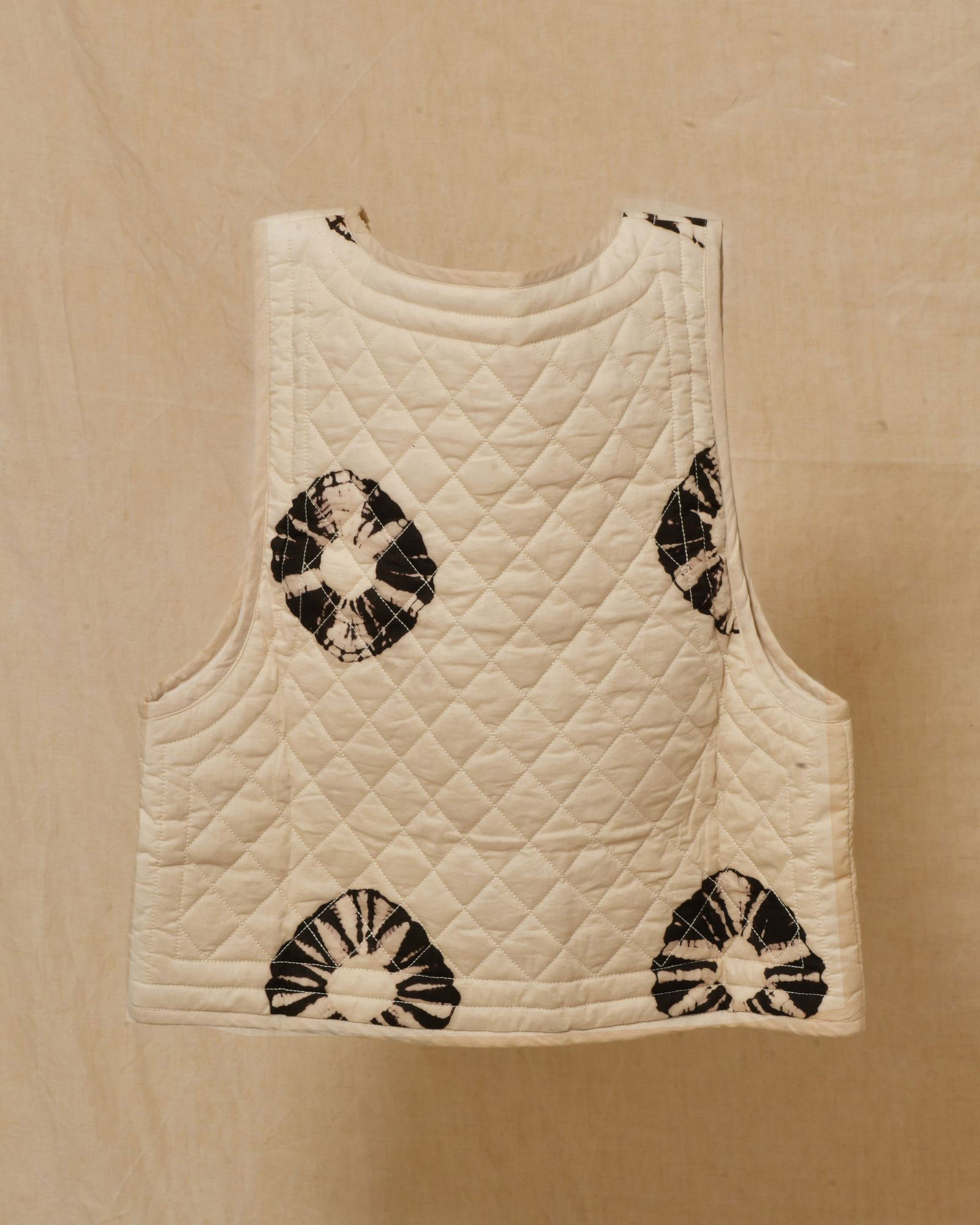 Gilet sans manches matelassé à imprimé abstrait Diega