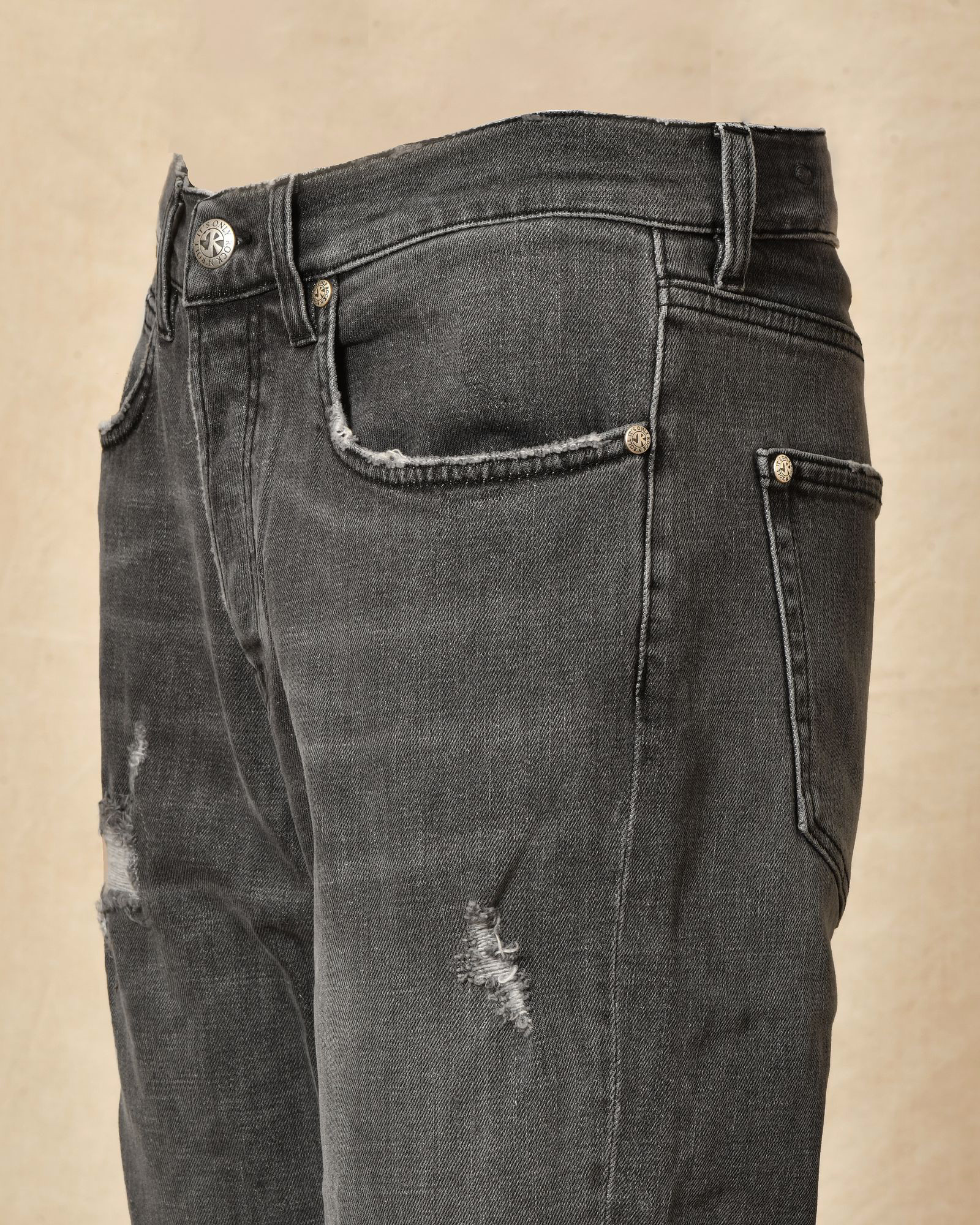 Jean gris délavé avec détails déchirés John Richmond