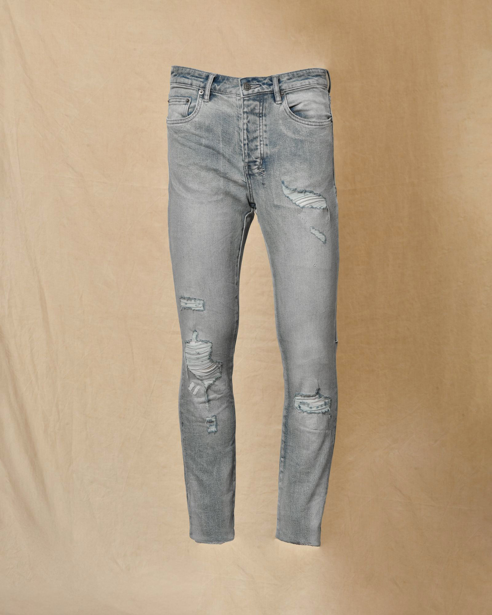 Jean délavé bleu à déchirures Ksubi