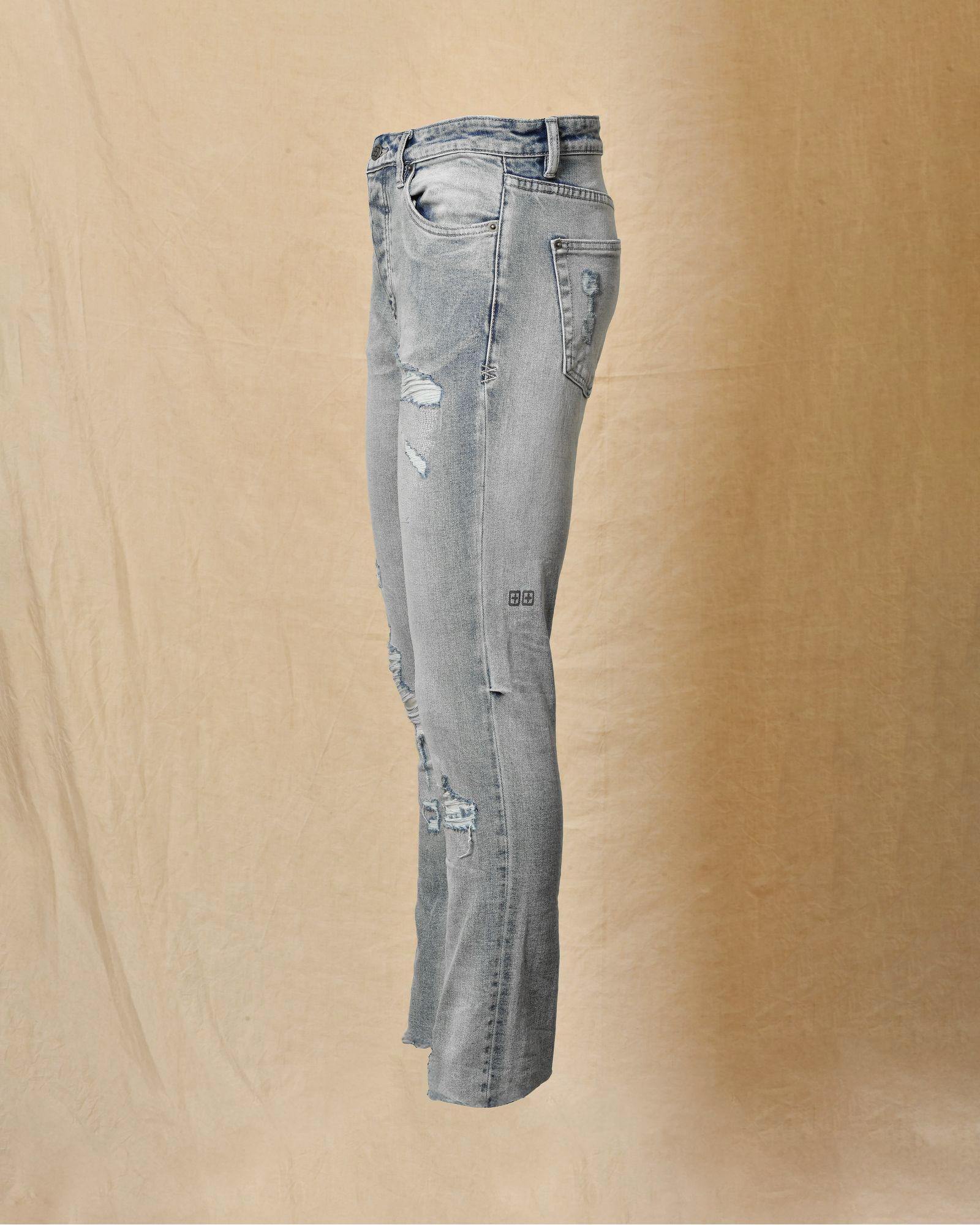 Jean délavé bleu à déchirures Ksubi