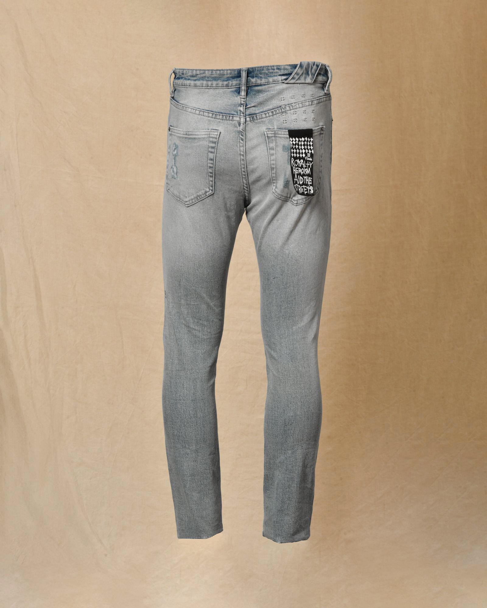 Jean délavé bleu à déchirures Ksubi