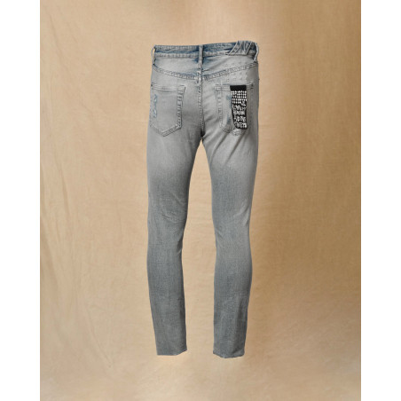 Jean délavé bleu à déchirures Ksubi