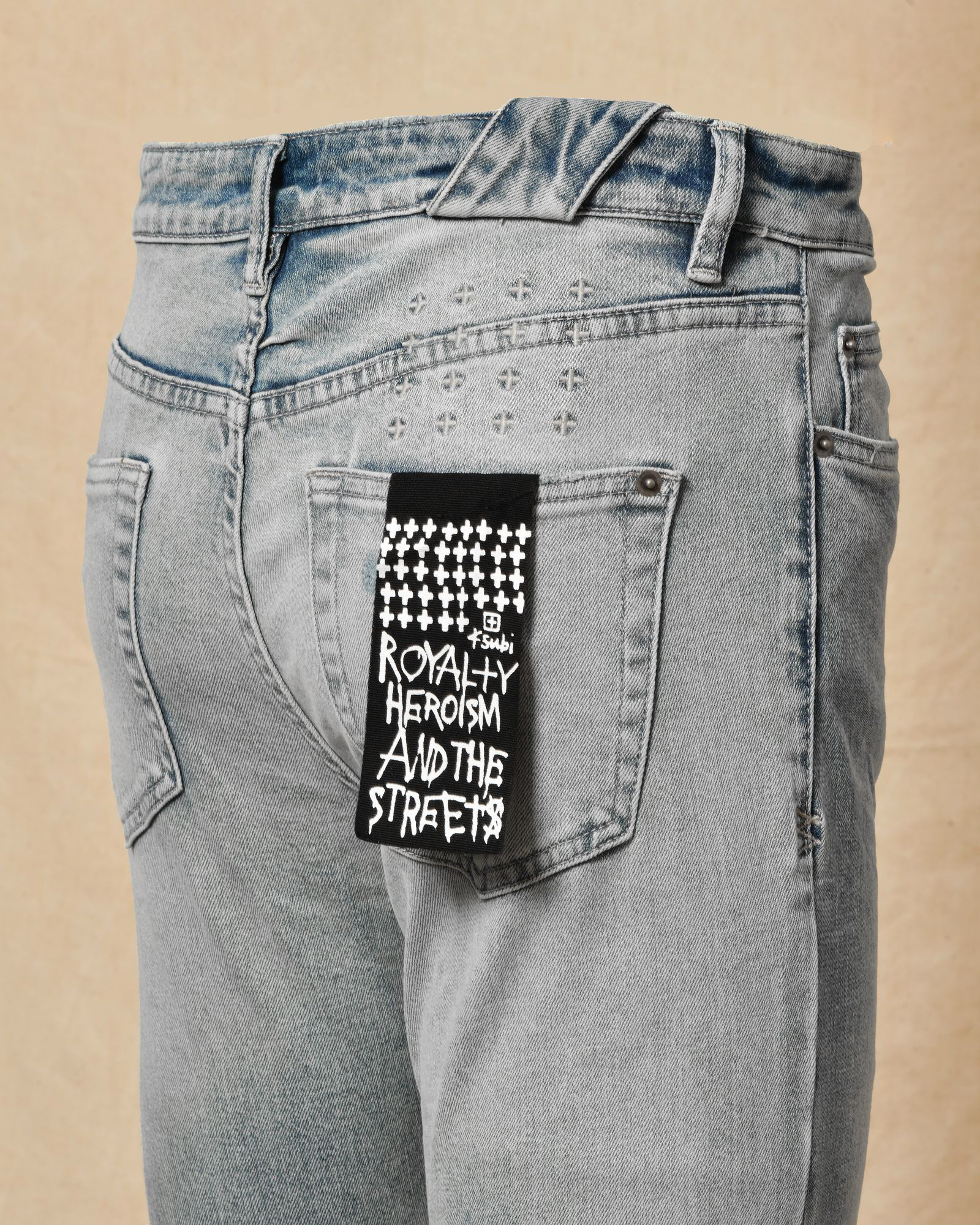 Jean délavé bleu à déchirures Ksubi