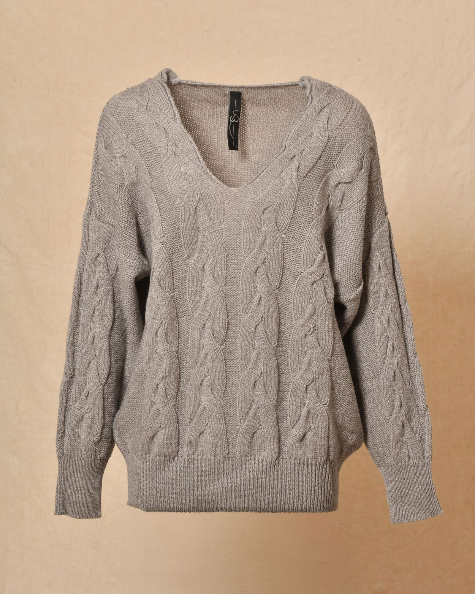 Pull en laine torsadé col V Emma White