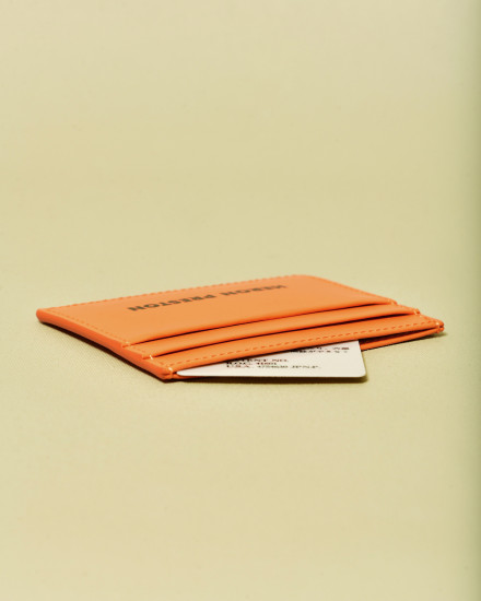 Portes cartes en cuir orange Heron Preston