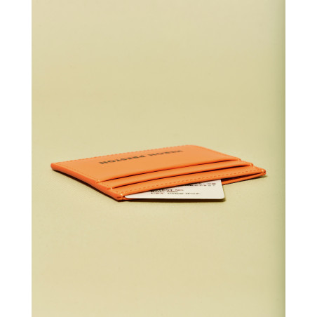 Portes cartes en cuir orange Heron Preston