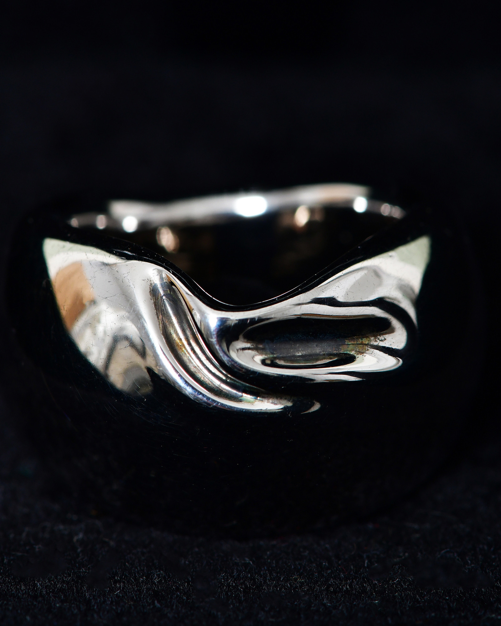 Bague drapée argentée Published By