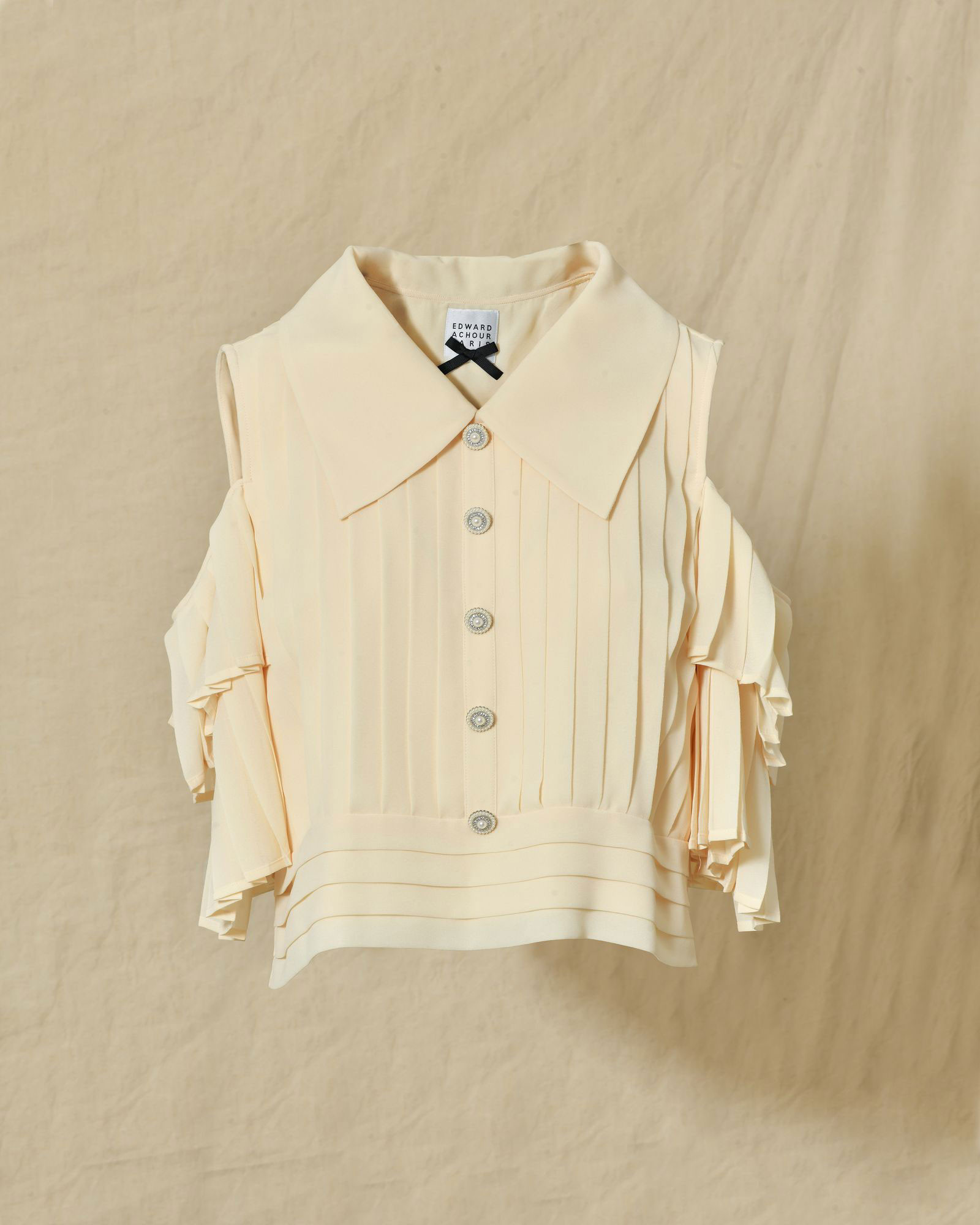 Top à volants et épaules dénudées beige Edward Achour