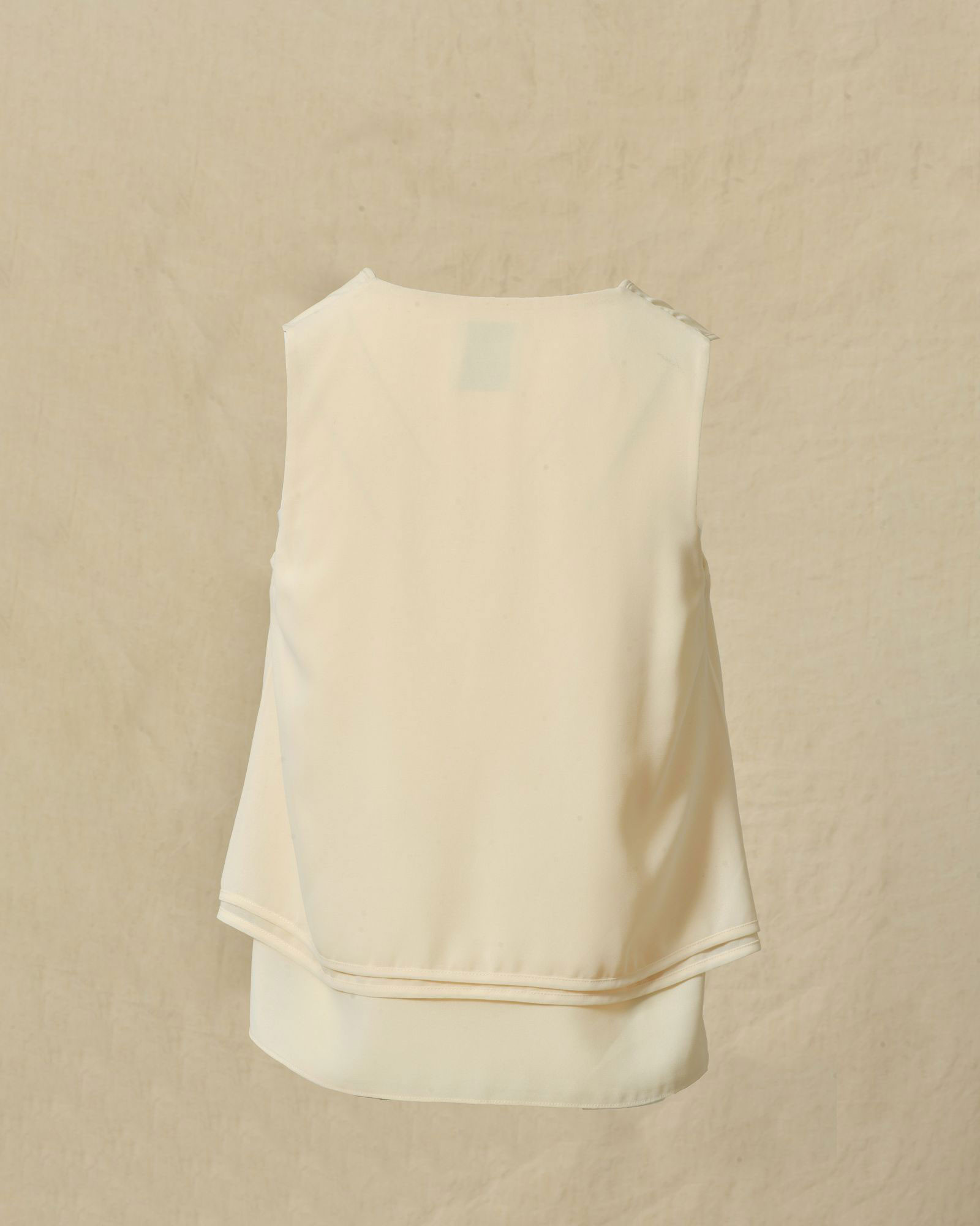 Top à volants beige à nœud Edward Achour