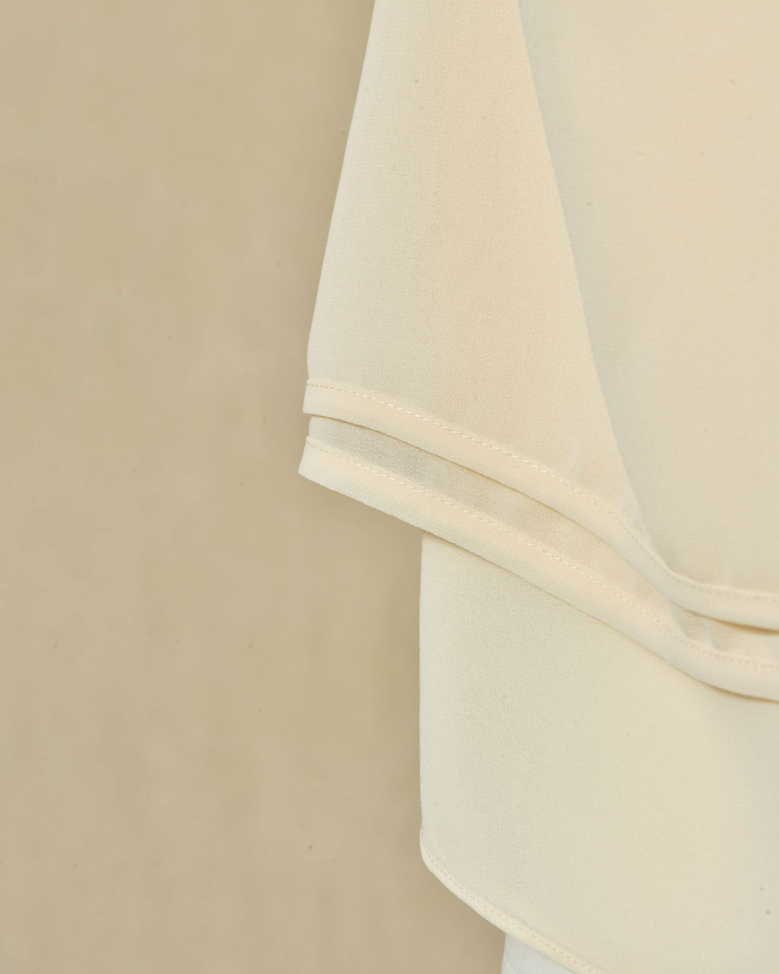 Top à volants beige à nœud Edward Achour