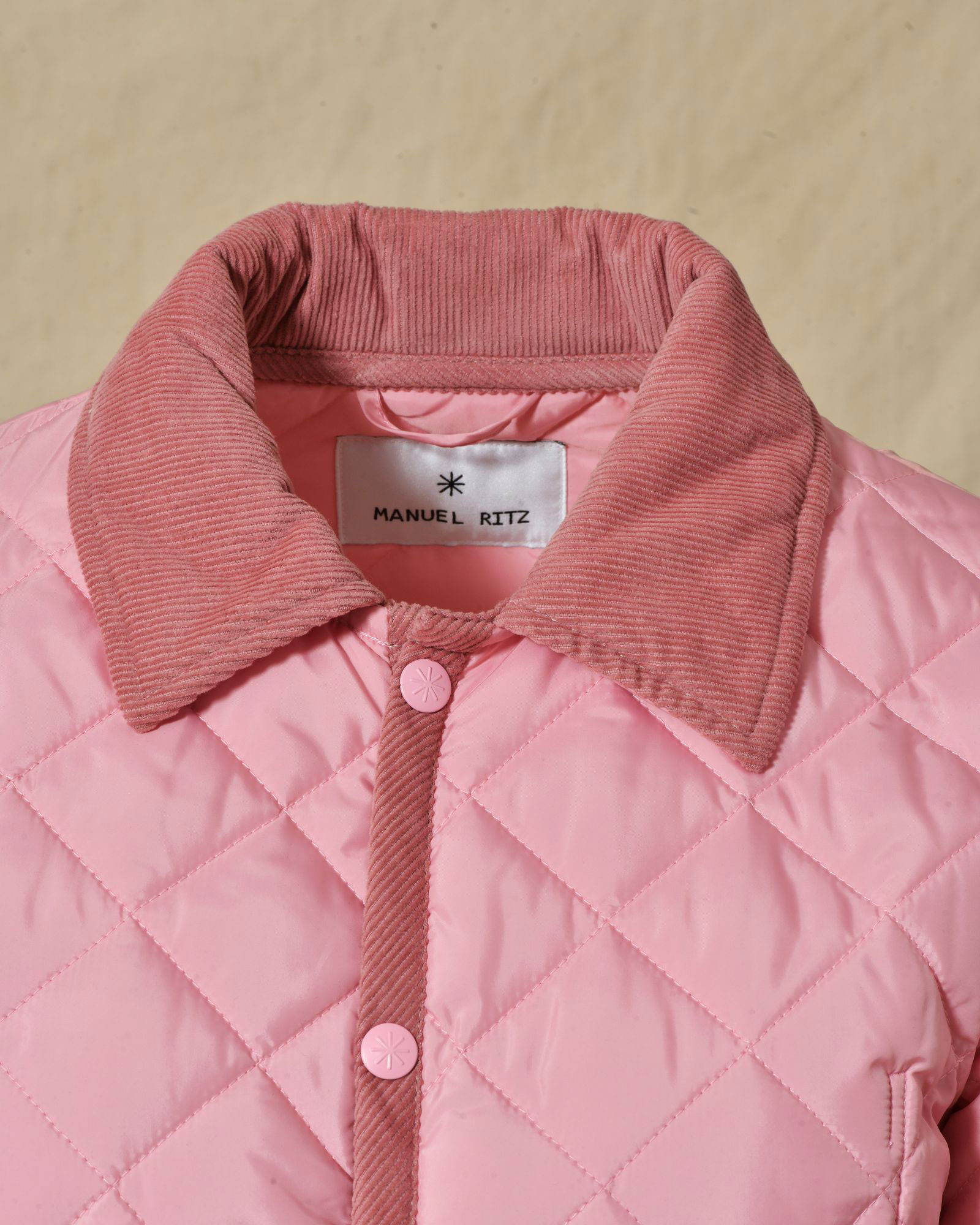 Blouson matelassé à col côtelé rose Manuel Ritz