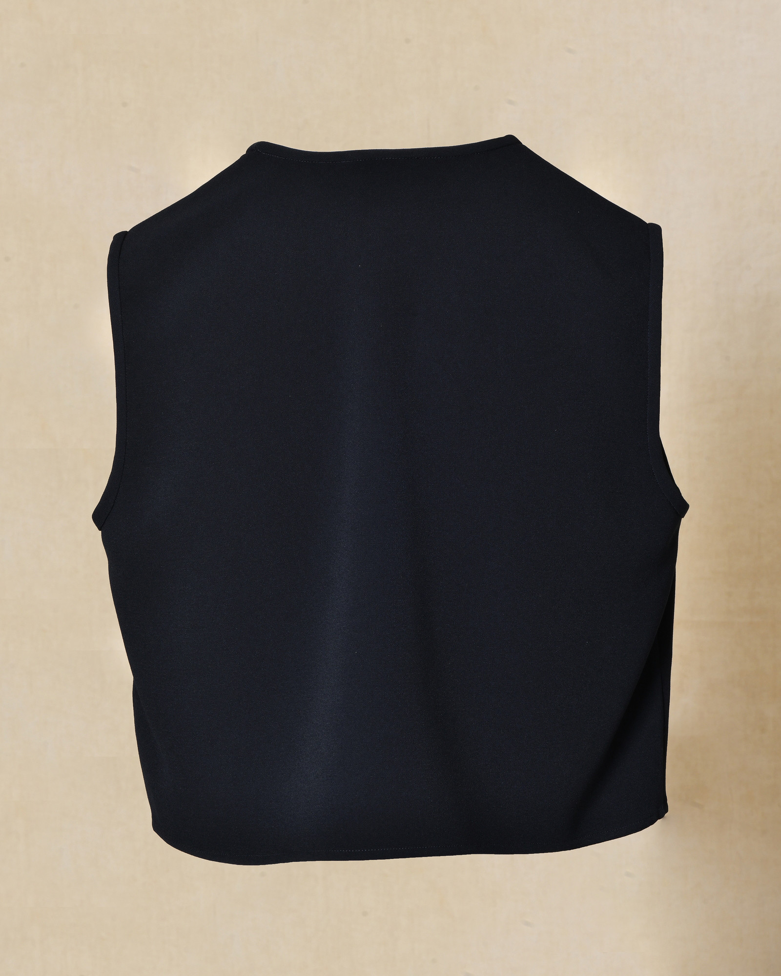 Top bleu sans manches à boutons décoratifs Edward Achour