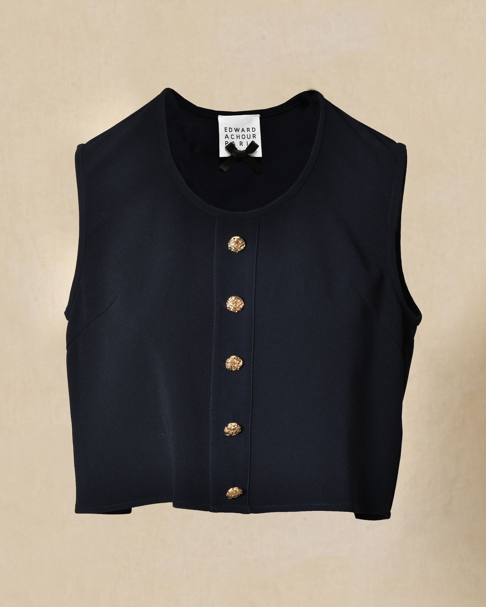 Top bleu sans manches à boutons décoratifs Edward Achour