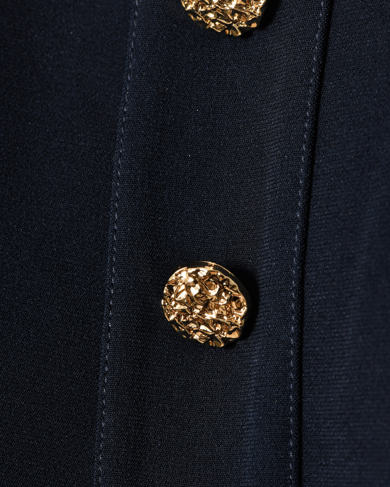 Top bleu sans manches à boutons décoratifs Edward Achour