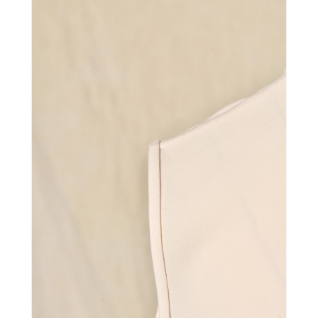 Top beige sans manches à boutons décoratifs Edward Achour