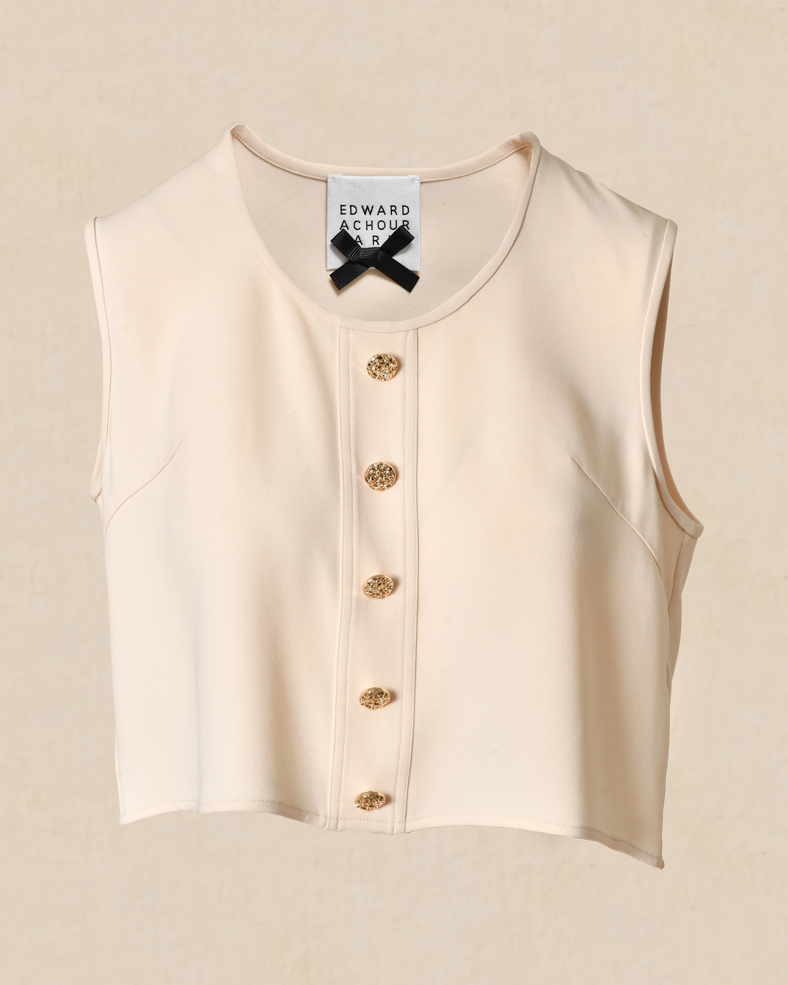 Top beige sans manches à boutons décoratifs Edward Achour