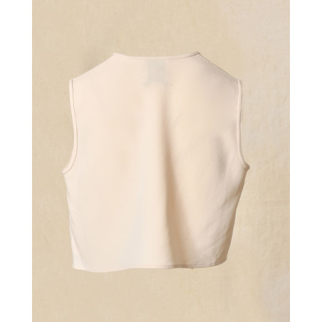 Top beige sans manches à boutons décoratifs Edward Achour