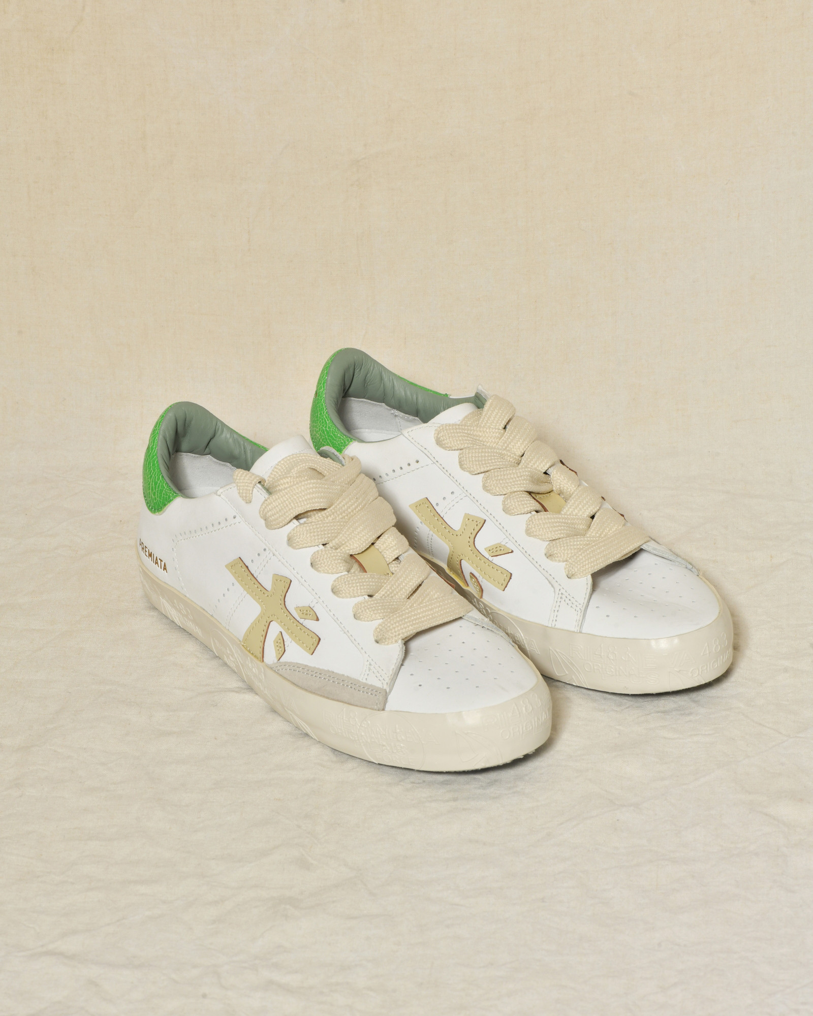 Baskets blanches en cuir à talon vert texturé Premiata