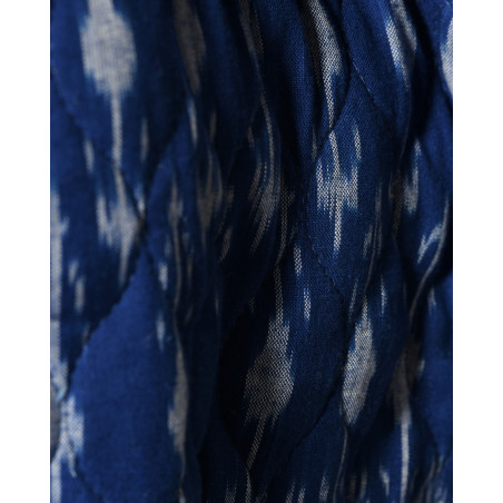 Veste sans manches matelassée bleue à motifs ikat V.de.Vinster