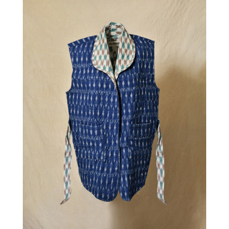 Veste sans manches matelassée bleue à motifs ikat V.de.Vinster