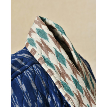 Veste sans manches matelassée bleue à motifs ikat V.de.Vinster