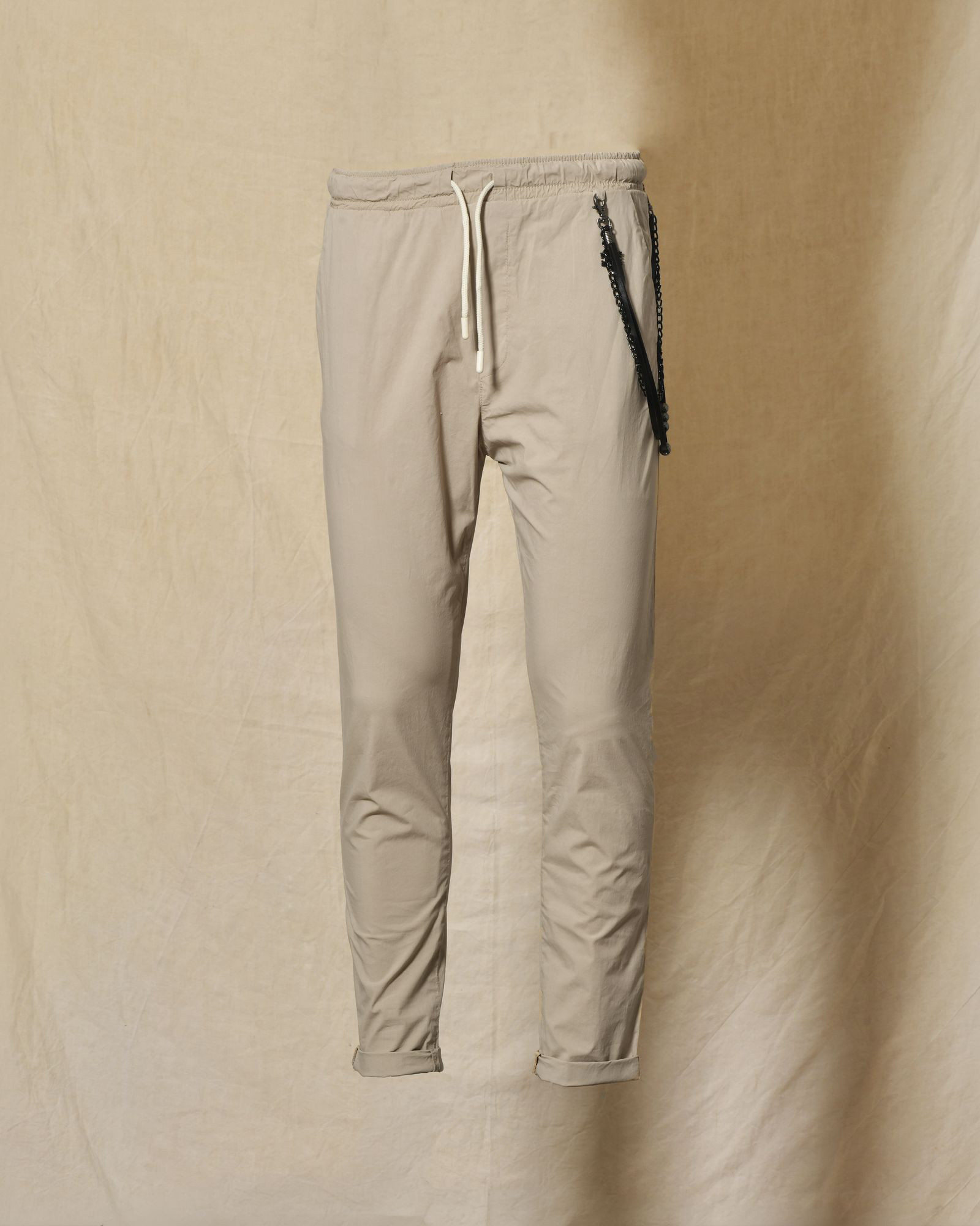 Pantalon en tissu technique beige Over-D
