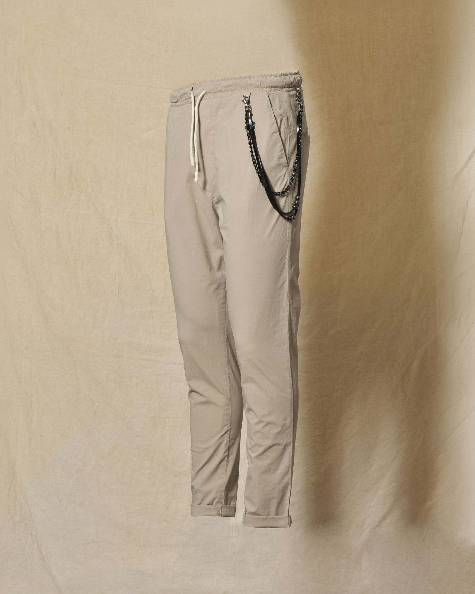 Pantalon en tissu technique beige Over-D