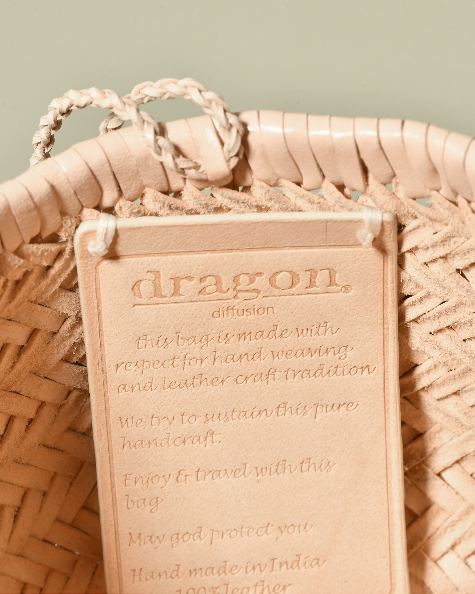 Pochette à bandoulière tressée rose Dragon Diffusion