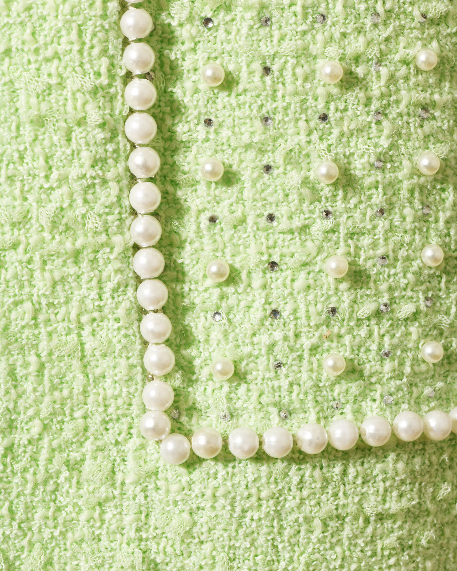 Manteau en tweed vert pastel orné de perles Edward Achour