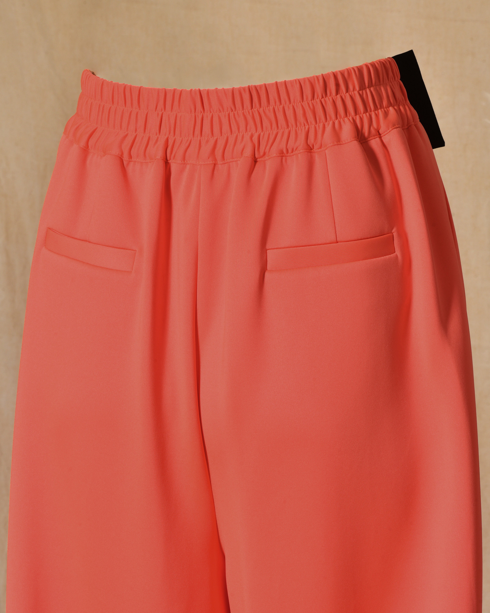 Pantalon corail avec noeud à strass Edward Achour
