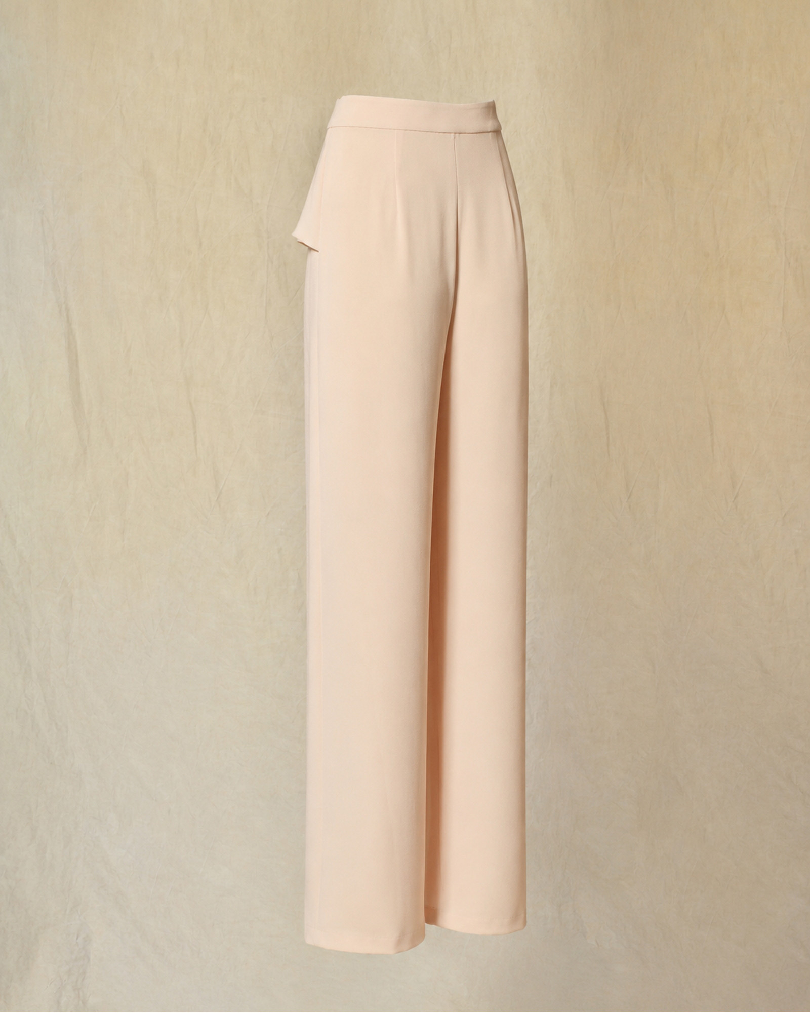 Pantalon palazzo rose poudré à détail volanté Edward Achour