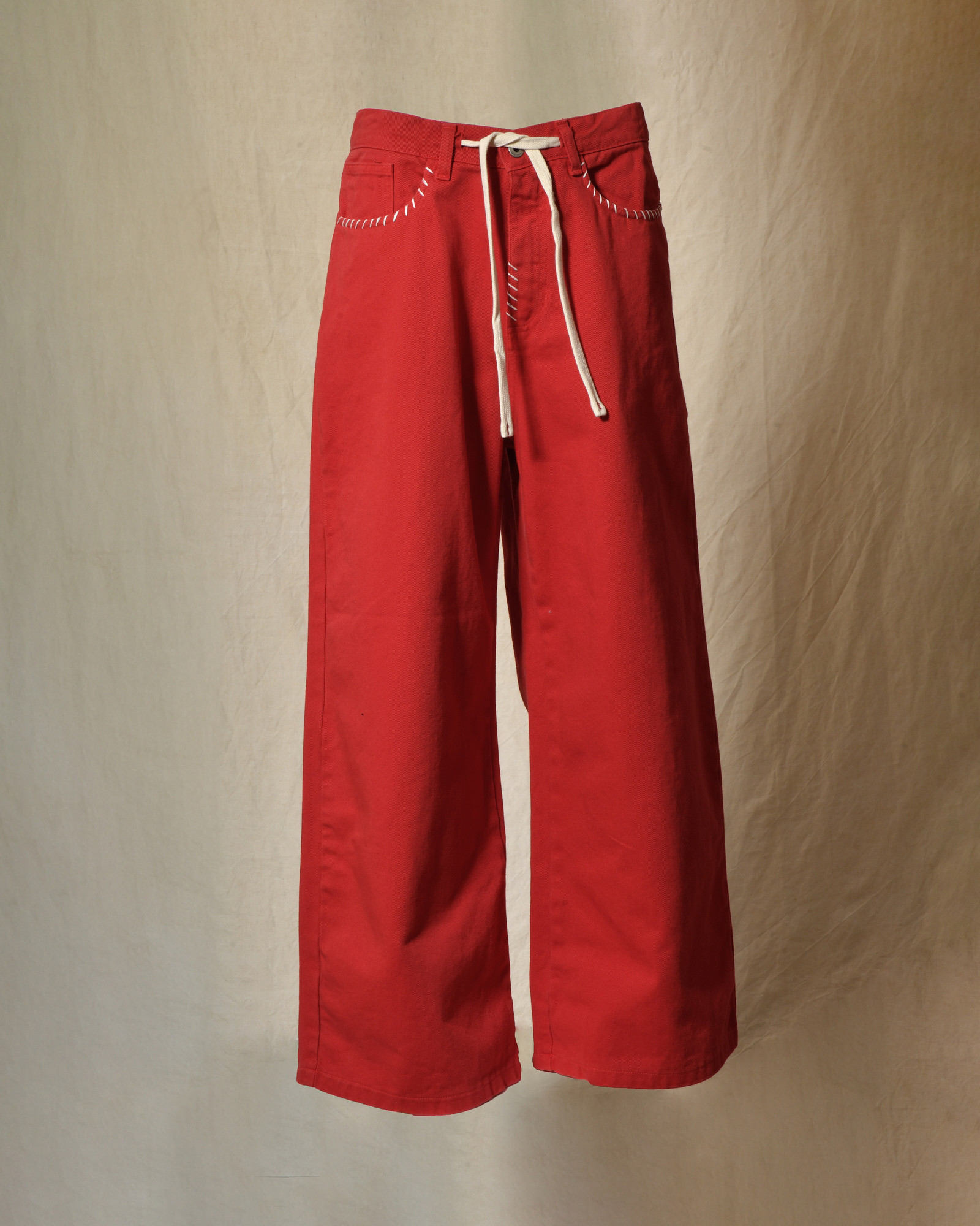 Jean wide leg rouge à surpiqures beige Front Street