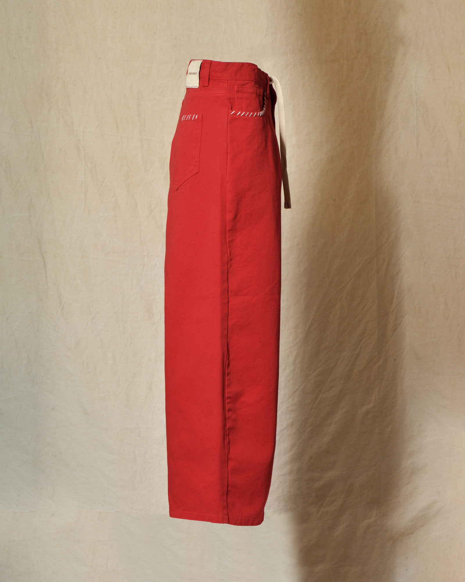Jean wide leg rouge à surpiqures beige Front Street