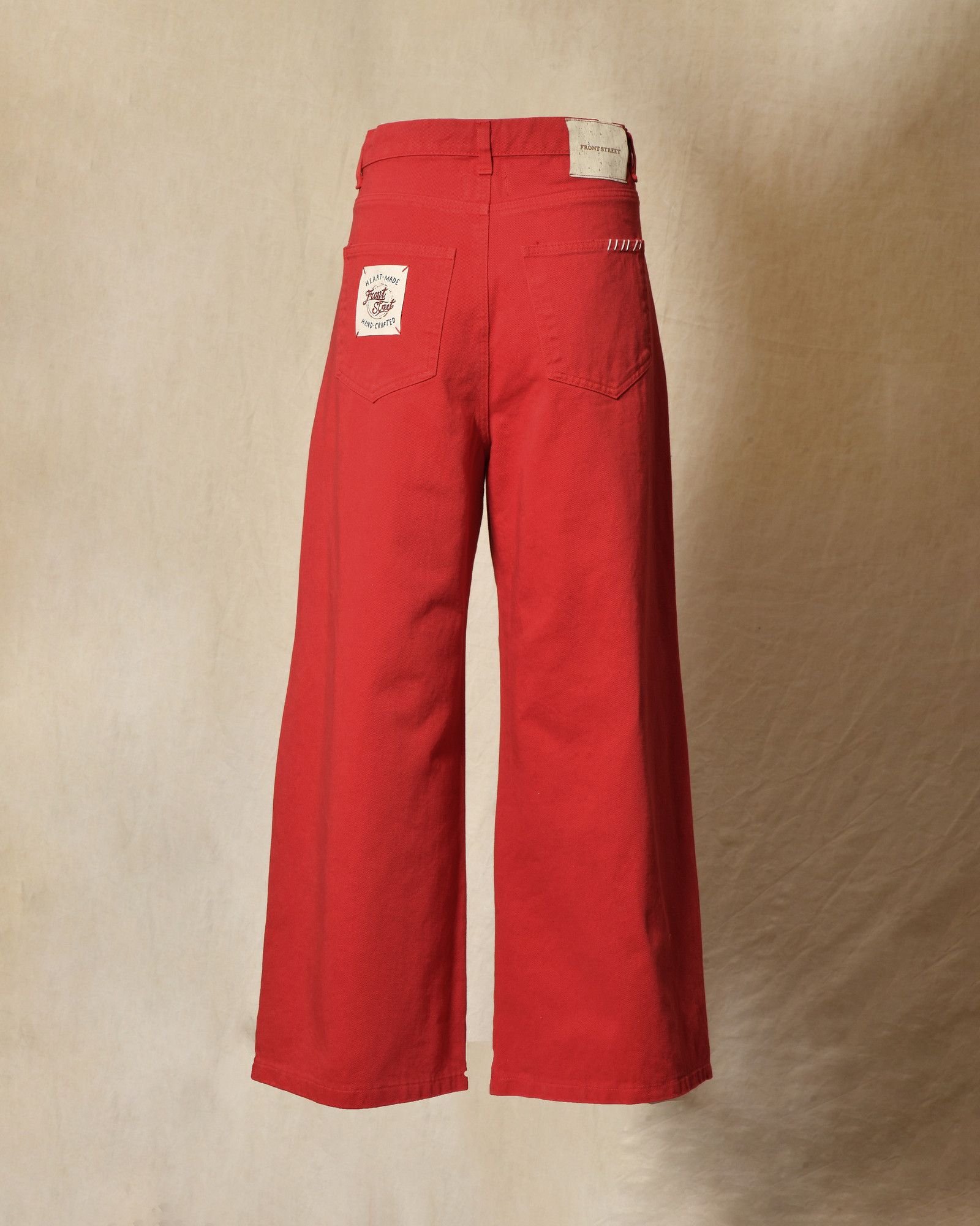 Jean wide leg rouge à surpiqures beige Front Street