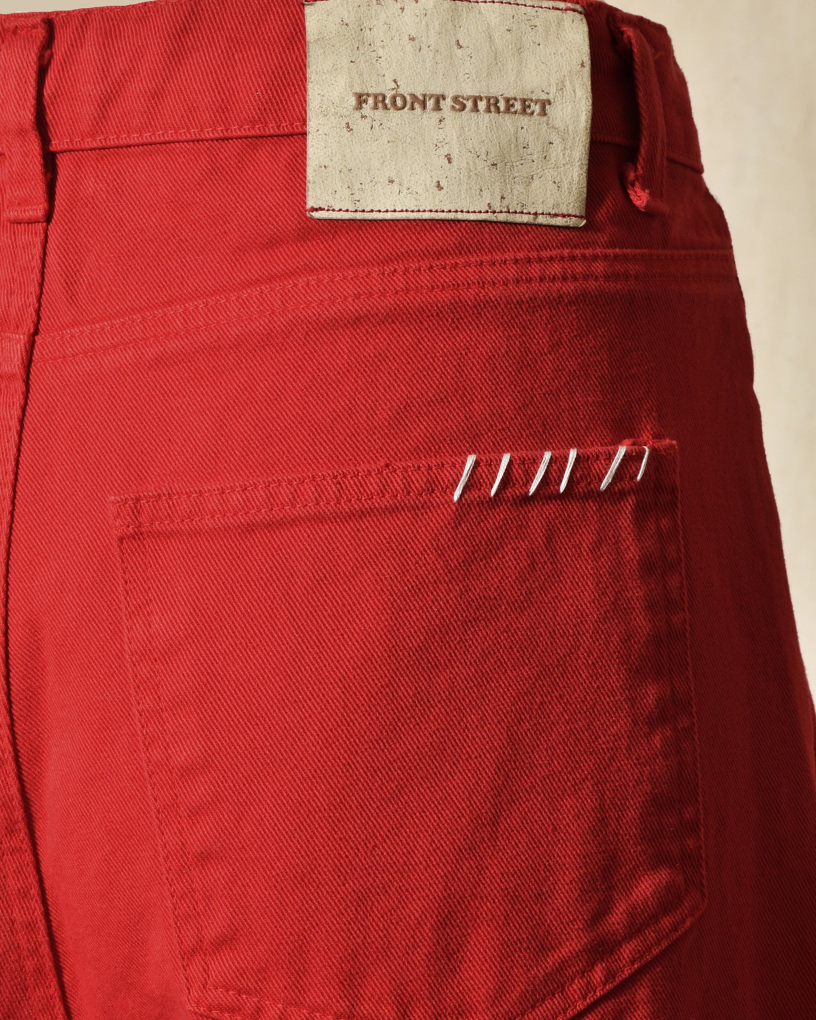 Jean wide leg rouge à surpiqures beige Front Street