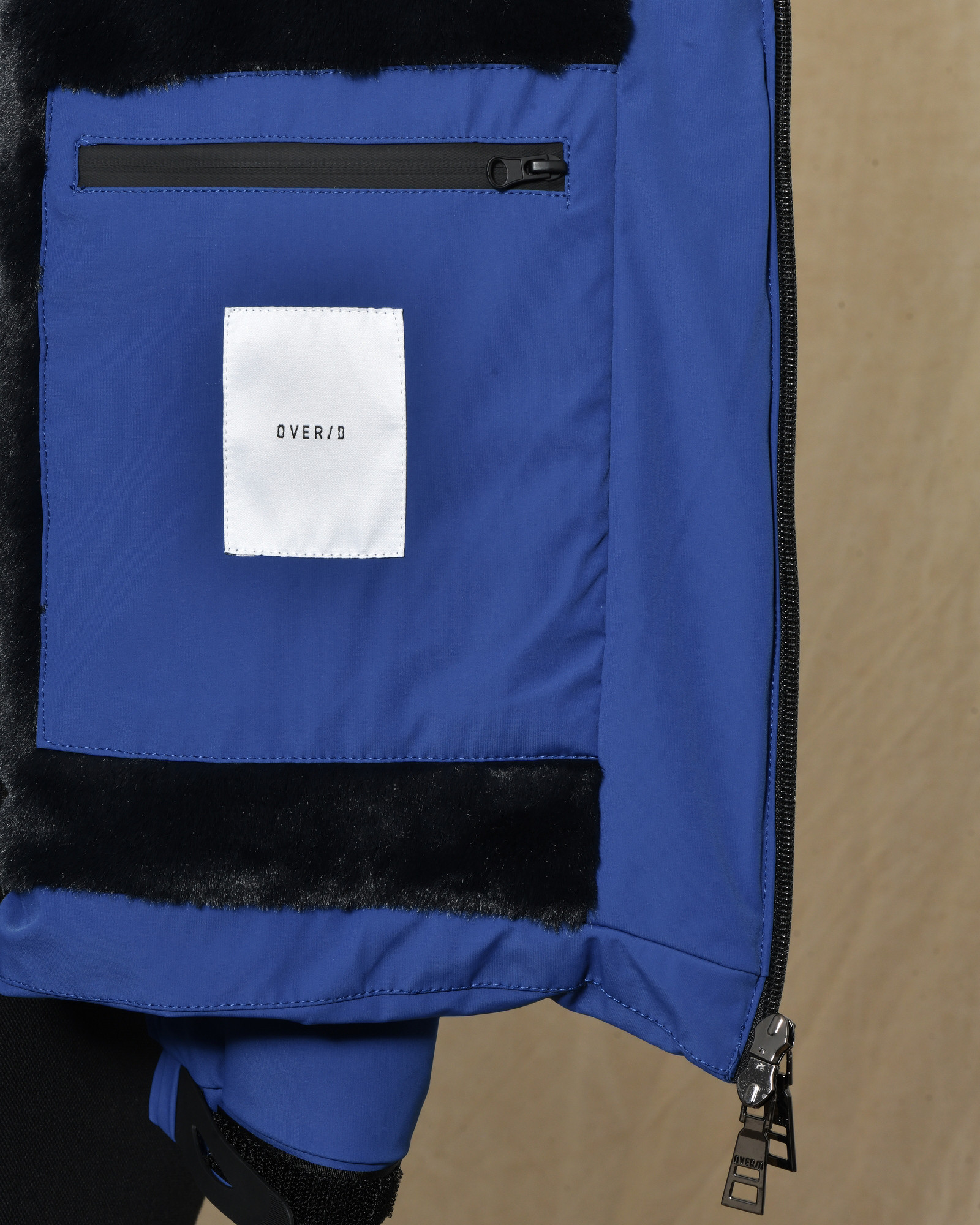 Veste technique bleue à capuche Over-D