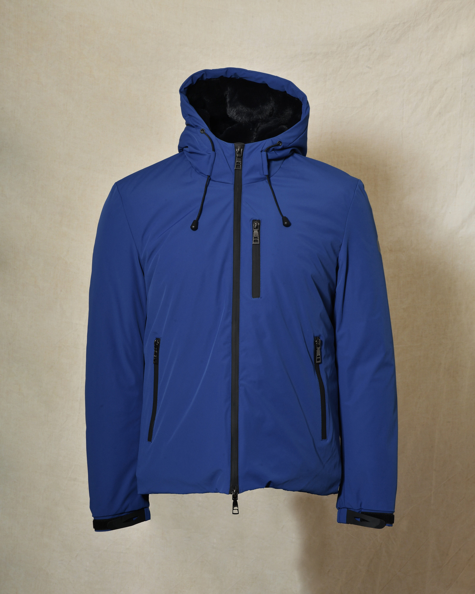 Veste technique bleue à capuche Over-D
