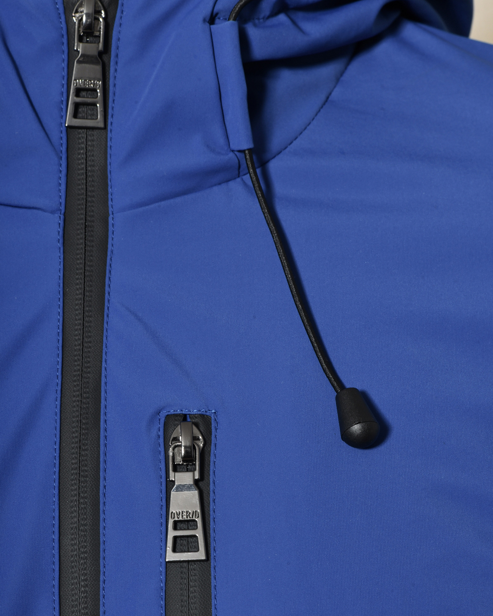 Veste technique bleue à capuche Over-D