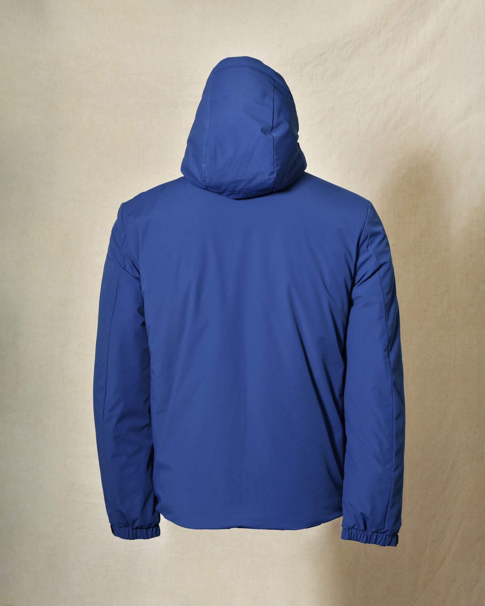 Veste technique bleue à capuche Over-D