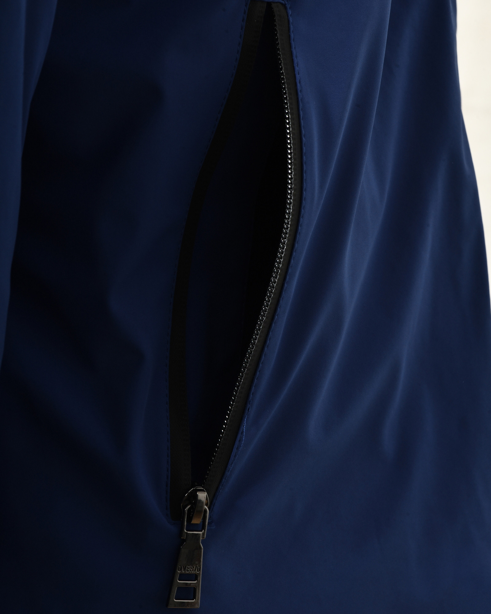 Veste technique bleue à capuche Over-D