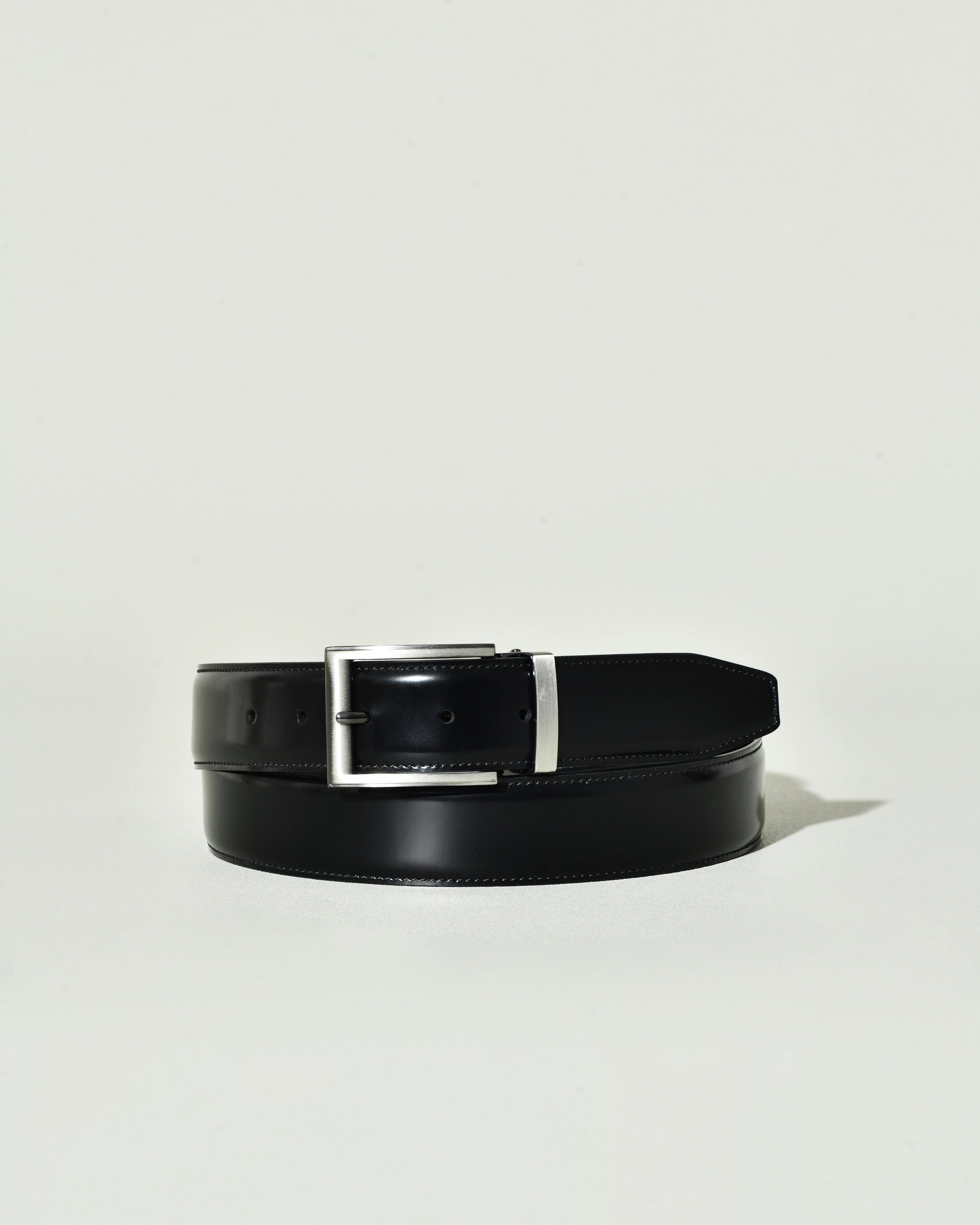 Ceinture en cuir lisse verni noir réglable Falorni