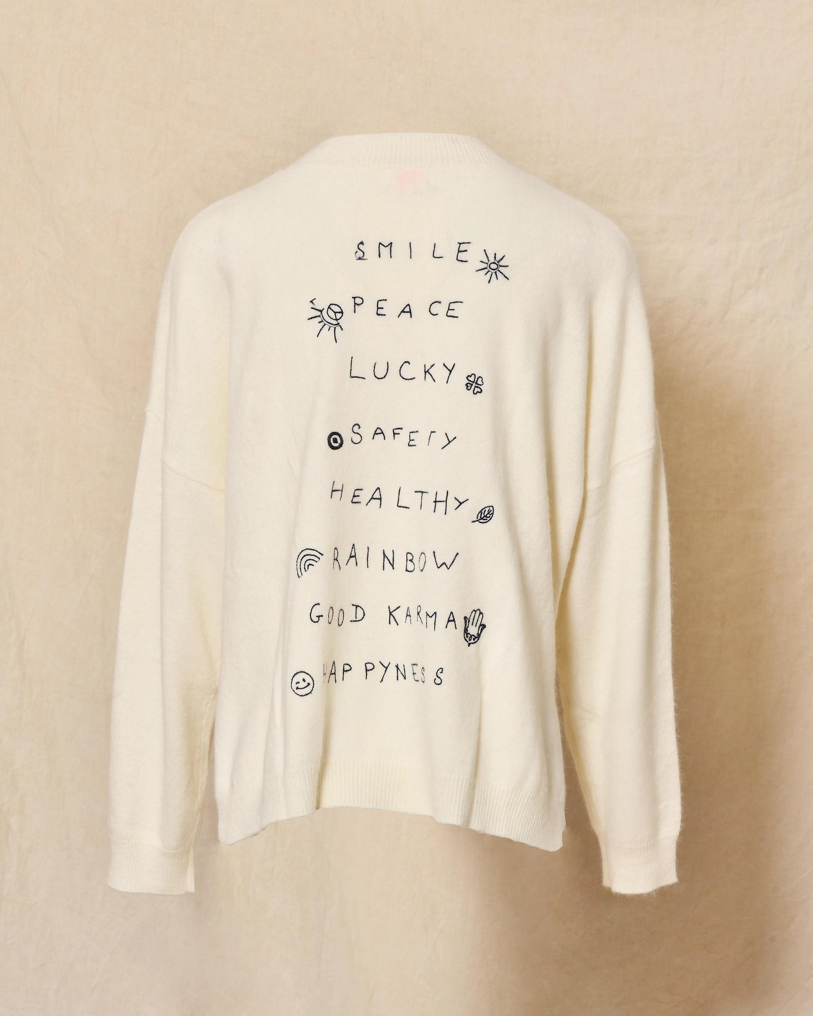 Pull en laine crème à inscriptions brodées bleues Ma Petite Capsule